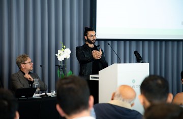 Farhan Ferozali presenting his paper in the 91茄子 research conference 2023.